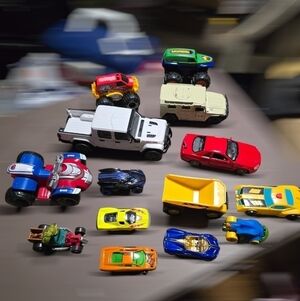 Lot of 14 misc toys cars some hotwheels,paw patrol,jeep